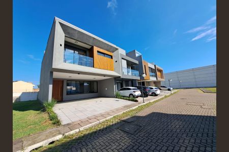 Casa de condomínio à venda com 224m², 3 quartos e 3 vagas Casa de condomínio à venda com 224m², 3 quartos e 3 vagasFachada da Casa