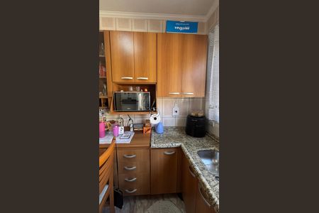 Casa à venda com 68m², 2 quartos e 2 vagas Casa à venda com 68m², 2 quartos e 2 vagasCozinha