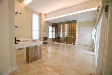 Casa de condomínio para alugar com 420m², 4 quartos e 4 vagasSala