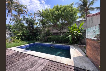 Casa de condomínio à venda com 460m², 5 quartos e 2 vagasÁrea externa