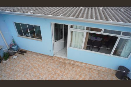 Casa à venda com 128m², 4 quartos e 2 vagas Casa à venda com 128m², 4 quartos e 2 vagasFachada casa 2 fundos