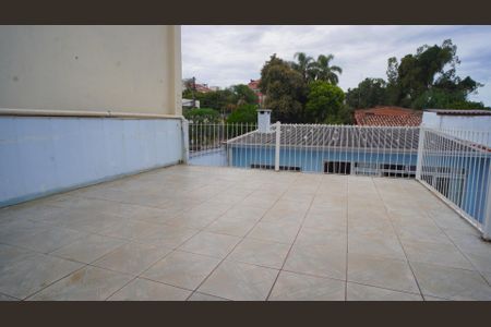 Casa à venda com 128m², 4 quartos e 2 vagas Casa à venda com 128m², 4 quartos e 2 vagasVaranda casa 1 com vista para casa 2