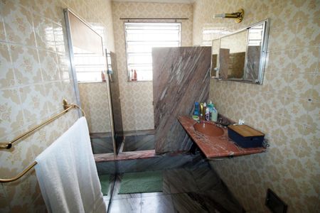 Casa à venda com 240m², 4 quartos e 3 vagasBanheiro da Suíte 1