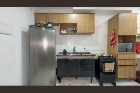 Apartamento à venda com 40m², 2 quartos e 1 vaga Apartamento à venda com 40m², 2 quartos e 1 vagaCozinha e Área de Serviço