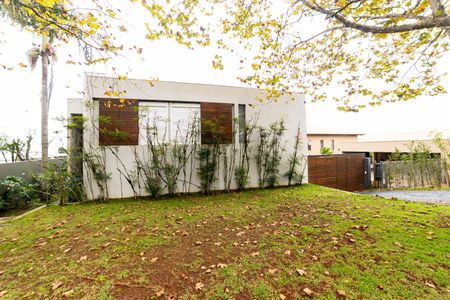 Casa de condomínio para alugar com 390m², 4 quartos e 4 vagas