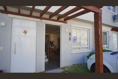 Casa de condomínio para alugar com 60m², 2 quartos e 1 vaga Casa de condomínio para alugar com 60m², 2 quartos e 1 vagaFachada e garagem