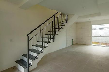 Sala de casa de condomínio para alugar com 2 quartos, 80m² em Vila Nova, Porto Alegre