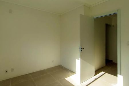 Quarto 2 de casa de condomínio para alugar com 2 quartos, 80m² em Vila Nova, Porto Alegre