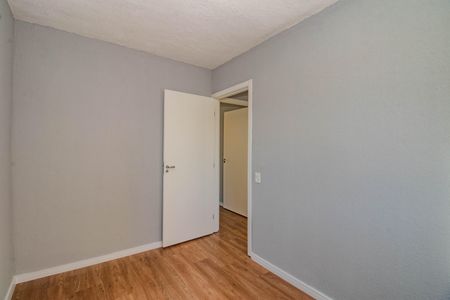 Quarto 1 de apartamento para alugar com 2 quartos, 42m² em Sarandi, Porto Alegre
