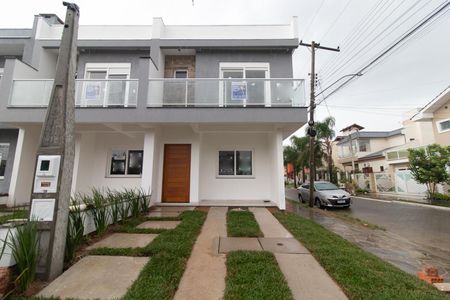 Casa à venda com 128m², 3 quartos e 1 vaga Casa à venda com 128m², 3 quartos e 1 vagaFachada