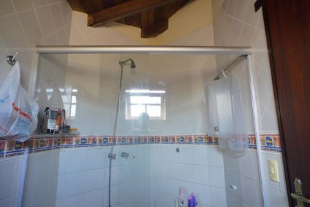 Casa à venda com 389m², 4 quartos e 3 vagasBanheiro suíte 4