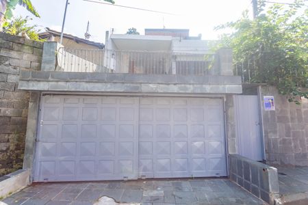 Casa à venda com 133m², 2 quartos e 2 vagas Casa à venda com 133m², 2 quartos e 2 vagasFachada + placa