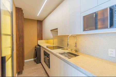 Cozinha de apartamento para alugar com 1 quarto, 45m² em Auxiliadora, Porto Alegre
