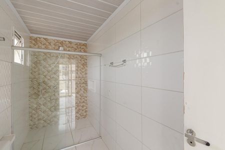 Casa de condomínio para alugar com 440m², 4 quartos e 4 vagas Casa de condomínio para alugar com 440m², 4 quartos e 4 vagasBanheiro da Suíte 1