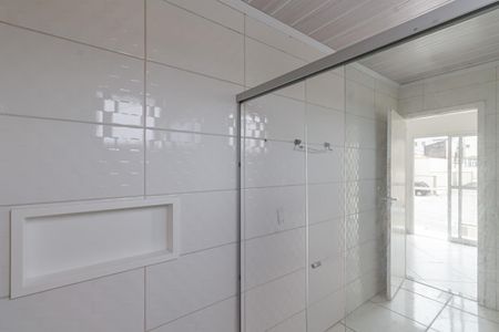Casa de condomínio para alugar com 440m², 4 quartos e 4 vagas Casa de condomínio para alugar com 440m², 4 quartos e 4 vagasBanheiro da Suíte 1