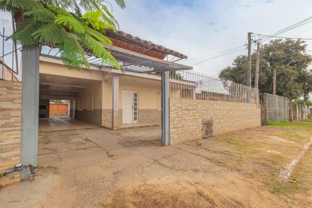 Casa para alugar com 280m², 5 quartos e 3 vagasFachada da casa da frente