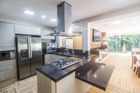 Casa de condomínio para alugar com 250m², 3 quartos e 3 vagasCozinha