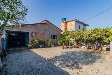 Casa à venda com 110m², 2 quartos e 2 vagas Casa à venda com 110m², 2 quartos e 2 vagasQuintal da frente