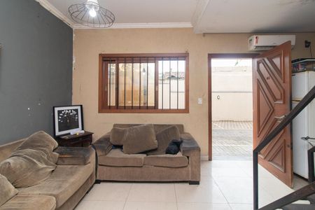 Sala de casa de condomínio à venda com 2 quartos, 74m² em Coronel Aparicio Borges, Porto Alegre