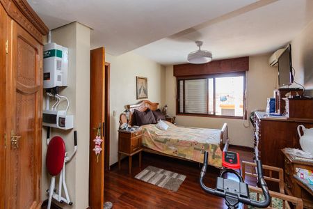 Suíte de casa de condomínio à venda com 3 quartos, 200m² em Santo Antônio, Porto Alegre