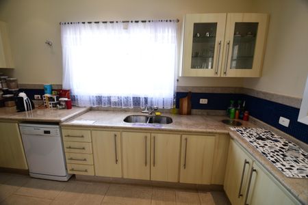 Casa de condomínio para alugar com 454m², 4 quartos e 3 vagasCozinha