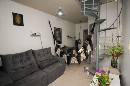 Sala de casa de condomínio à venda com 2 quartos, 36m² em Guarujá, Porto Alegre