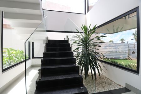 Casa de condomínio para alugar com 312m², 3 quartos e 4 vagashall Escada