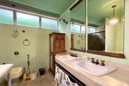 Casa à venda com 310m², 3 quartos e 2 vagasBanheiro da Suíte 1