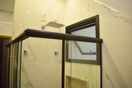 Casa de condomínio para alugar com 165m², 4 quartos e 4 vagasBanheiro da Suíte 2