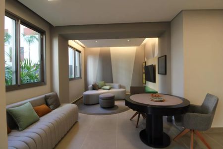 Sala de estar com sofás e mesa redonda, iluminada por luz natural e artificial. de apartamento à venda com 2 quartos, 47m² em Jardim Marajoara, São Paulo