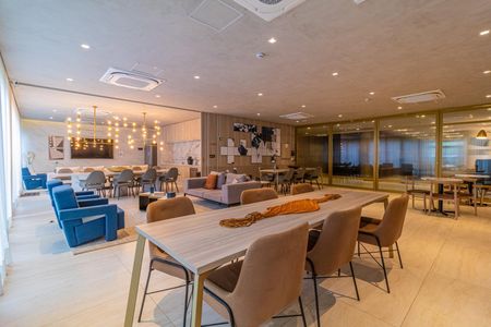 Apartamento à venda com 28m², 1 quarto e sem vagaSala de estar com móveis modernos e iluminação sofisticada, perfeita para relaxar e socializar.