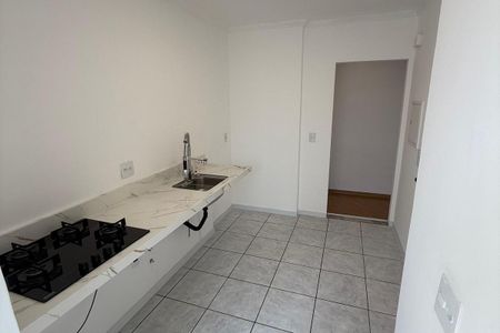 Cozinha com piso de porcelanato, bancada de granito e fogões de gás. de apartamento à venda com 3 quartos, 71m² em Assunção, São Bernardo do Campo