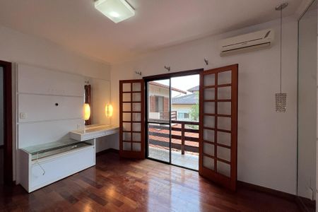 Casa de condomínio para alugar com 447m², 4 quartos e 4 vagasSuíte 1