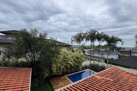 Casa de condomínio para alugar com 447m², 4 quartos e 4 vagasVista da Varanda da Suíte 1