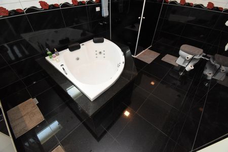 Casa para alugar com 311m², 3 quartos e 5 vagasBanheiro da Suíte 2