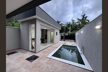 Casa de condomínio à venda com 410m², 4 quartos e 2 vagasÁrea externa