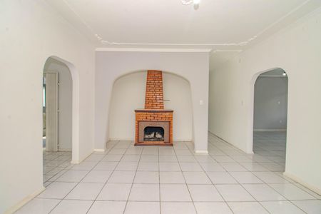 Sala de casa de condomínio à venda com 3 quartos, 212m² em Cristo Rei, Porto Alegre