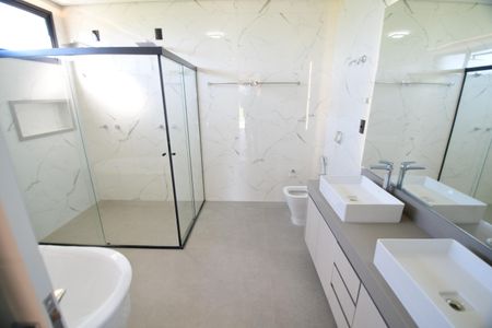 Casa de condomínio à venda com 340m², 5 quartos e 4 vagasBanheiro Suíte