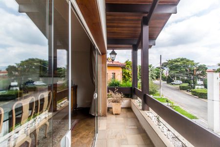 Casa de condomínio à venda com 409m², 4 quartos e 4 vagasVaranda