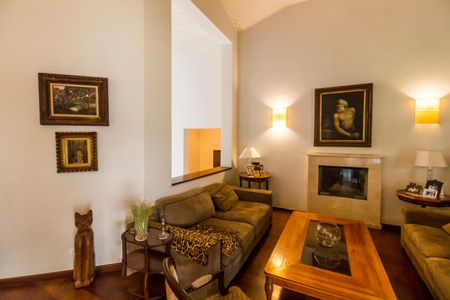 Casa de condomínio à venda com 409m², 4 quartos e 4 vagasSala 