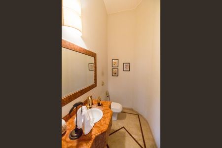 Casa de condomínio à venda com 409m², 4 quartos e 4 vagasLavabo