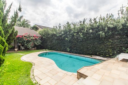 Casa de condomínio à venda com 409m², 4 quartos e 4 vagasPiscina