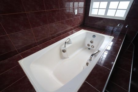 Casa para alugar com 442m², 5 quartos e 4 vagasBanheiro da Suíte