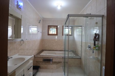 Casa à venda com 200m², 2 quartos e 2 vagasBanheiro da Suíte 1