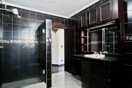 Casa à venda com 400m², 4 quartos e 8 vagasBanheiro da Suíte