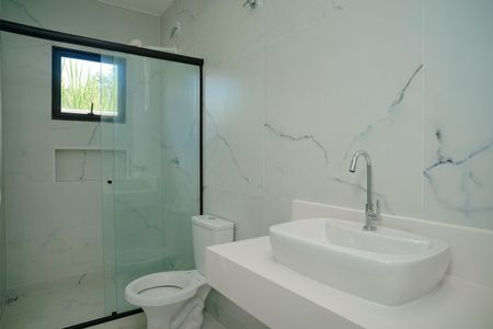 Casa de condomínio para alugar com 176m², 4 quartos e 4 vagasBanheiro Social