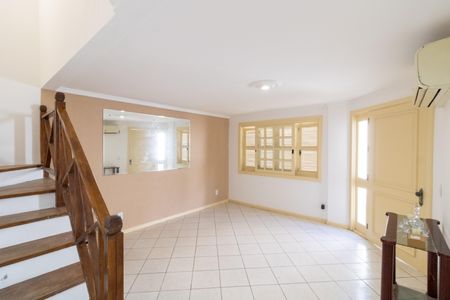 Sala de casa de condomínio para alugar com 3 quartos, 177m² em Ipanema, Porto Alegre