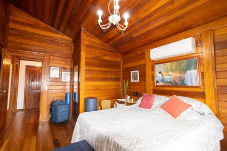 Casa de condomínio à venda com 335m², 4 quartos e 4 vagasSuite 1