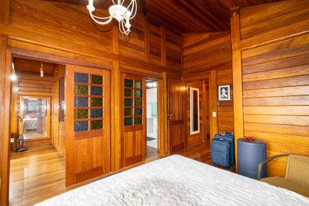 Casa de condomínio à venda com 335m², 4 quartos e 4 vagasSuite 1