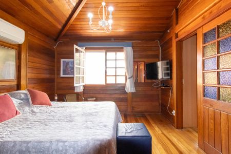 Casa de condomínio à venda com 335m², 4 quartos e 4 vagasSuite 1